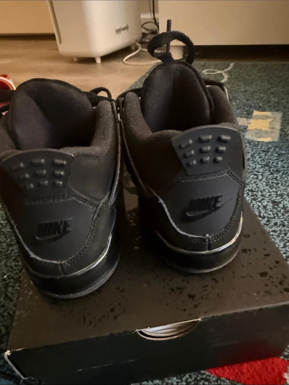 Jordan 4’s All-Black Retro Sneakers